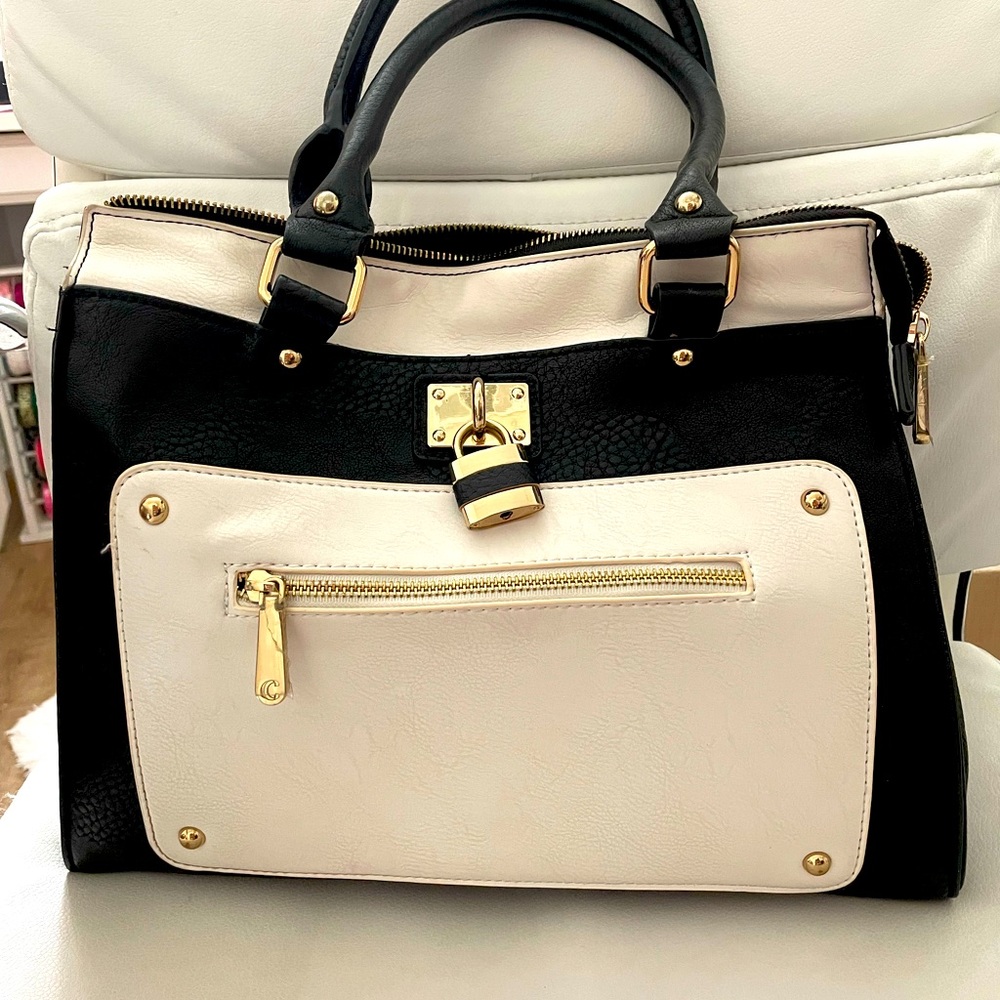 Beautiful black and cream white handbag